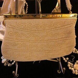 Elegant Cream Clutch with Gold Accents